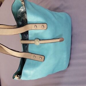 Teal pop of color bag from Charming Charlie